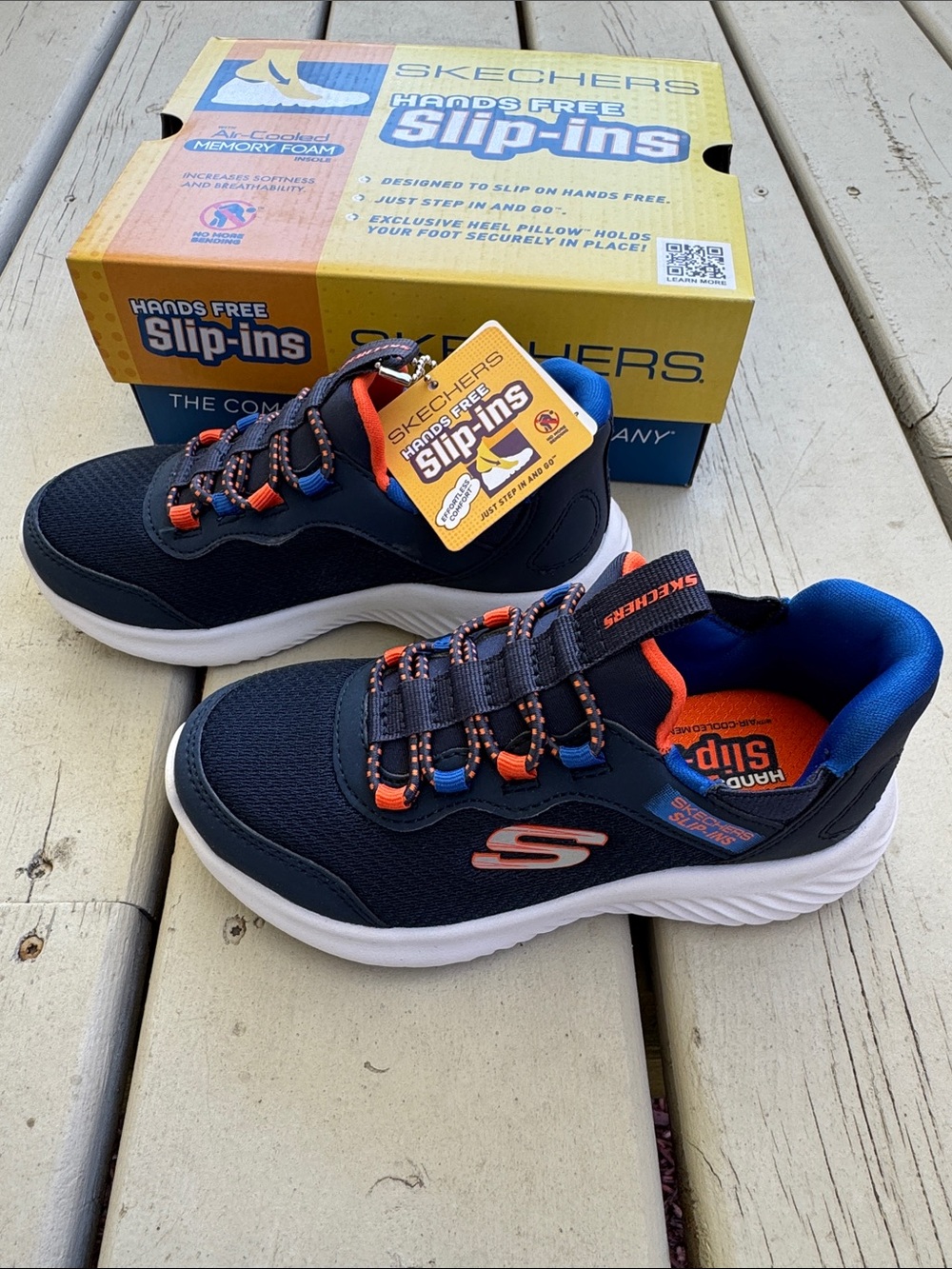 Skechers Kids Navy Slip-On Sneakers with Orange and Blue Accents - Picture 2 of 6